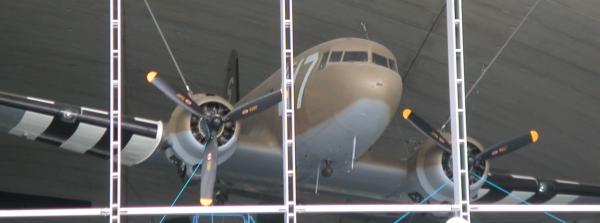 Dakota aeroplane behind empty windowframes
